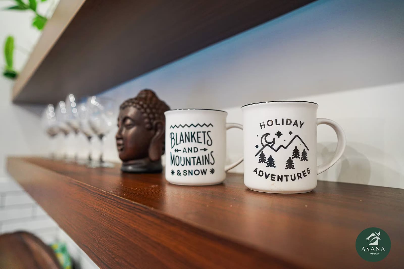 Mugs and glassware detail on the kitchen shelf