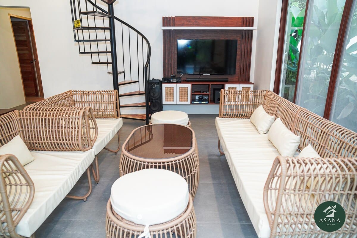 Living room with a view toward the hallway and front door