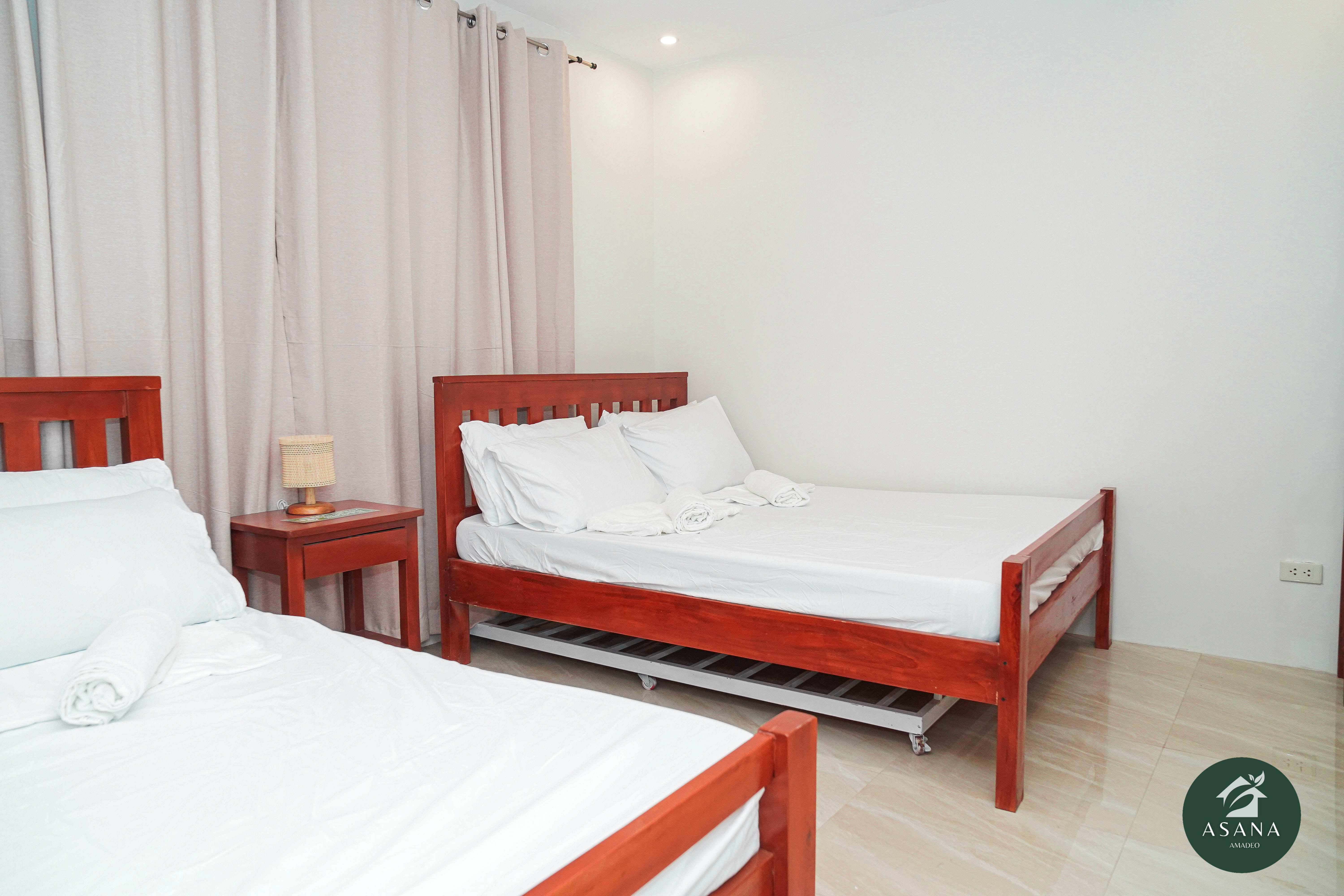 Bedroom 2 with two queen beds and air conditioning